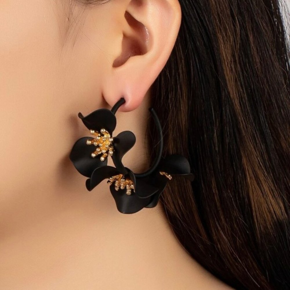Black and gold flower hoop earrings. New
